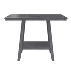 Gray square counter-height dining table with tapered base and lazy Susan