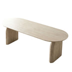 Off white oval extendable dining table with modern dual pillar base in a dining setting